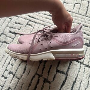 Nike Pink Sneakers with Air Cushioning and Mesh Upper